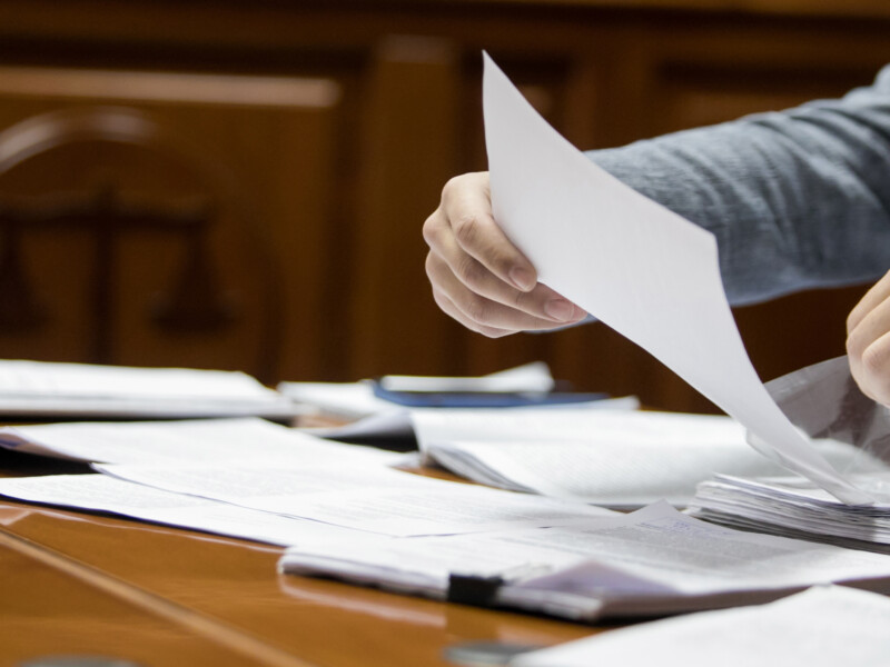 Lawyer sorting through legal documents
