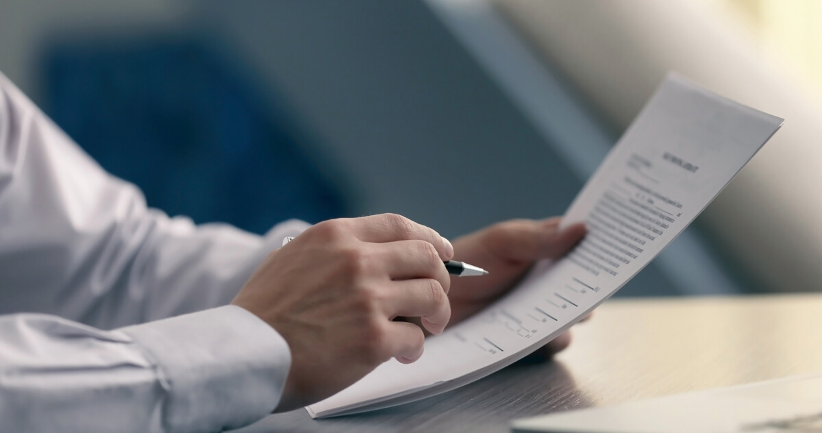 Business man reviewing corporate business documents